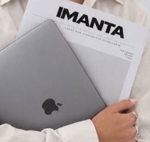 Carpeta de IMANTA y laptop